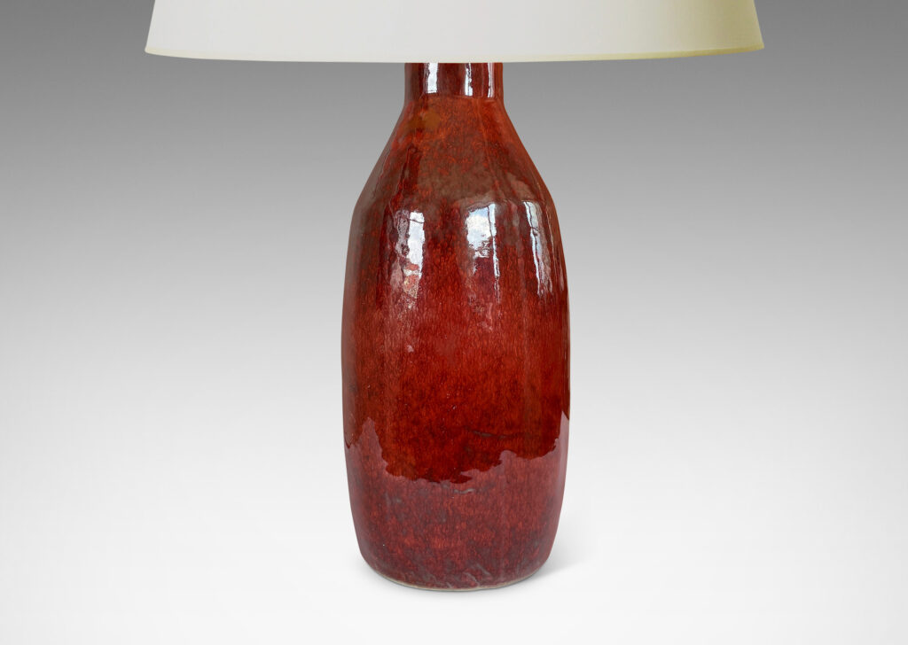 Gallery BAC organically modeled bottle form, glazed in a warm burgundy-oxblood