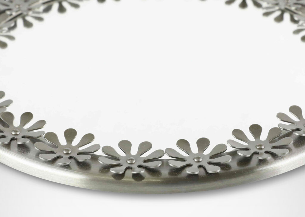 Gallery BAC daisy-like flower forms; silver metal and mirrored glass