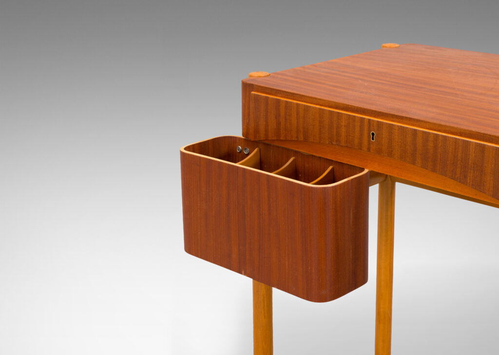 Gallery BAC two drawers and a swing-out caddy, with dowel-like framing and rounded corners