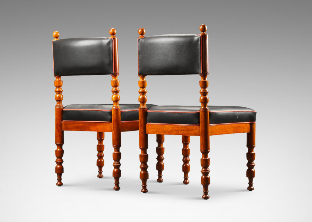 Gallery BAC upright turned legs and back stands, with vintage replacement leather upholstery; mahogany