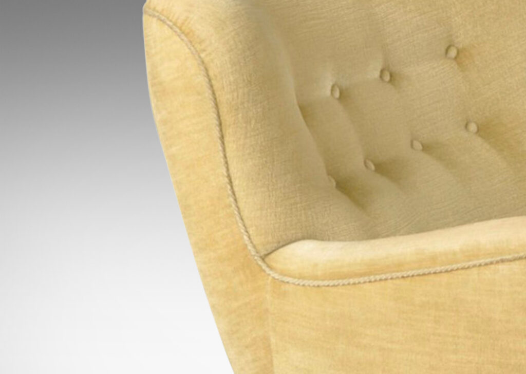 Gallery BAC dynamically contoured silhouette with complex curvature and tufted back; beech