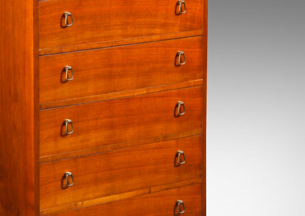 Gallery BAC tall case with four drawers, each with unique bell-shaped pulls; teak and brass