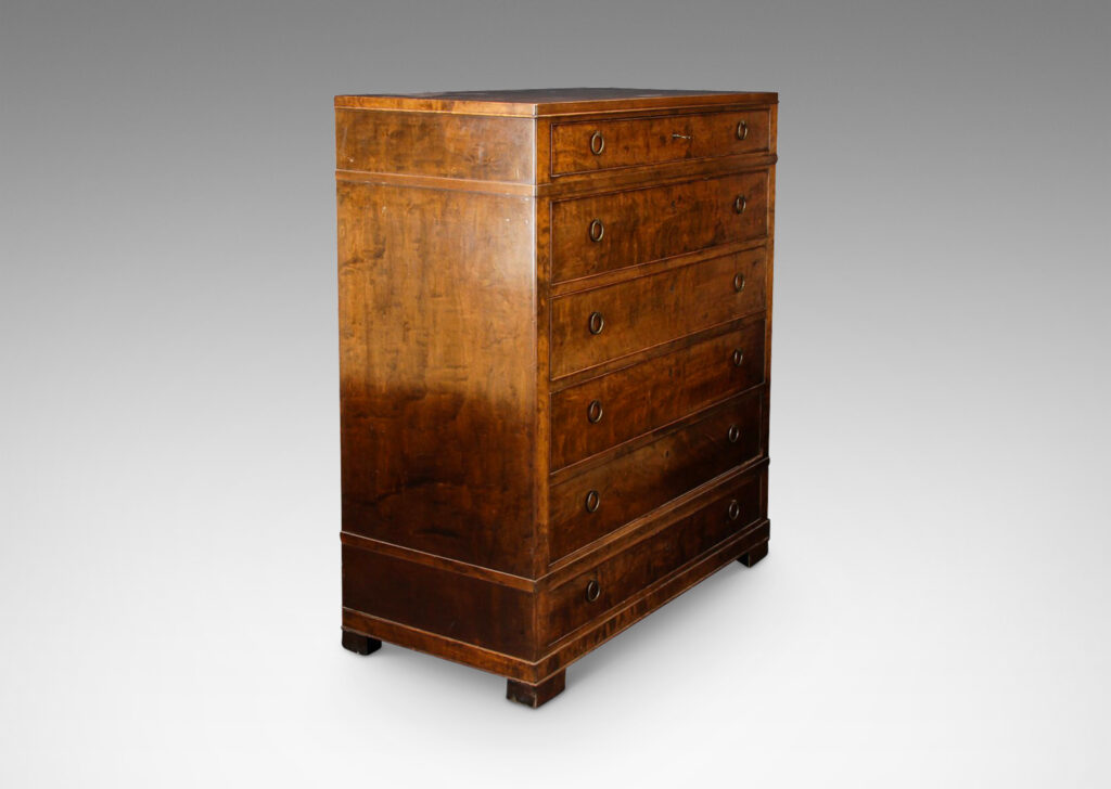 Gallery BAC tall case with six drawers, each with double ring pulls; walnut and brass