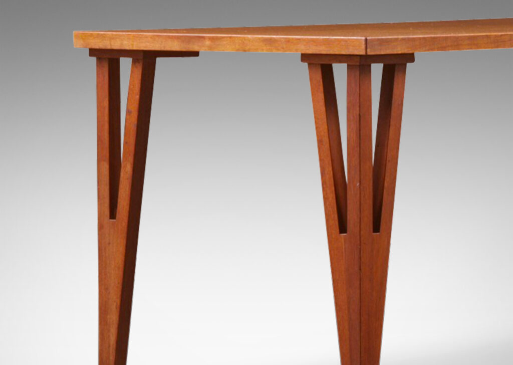 Gallery BAC rectangular floating surface on acute triangle legs; teak