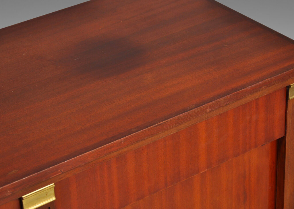 Gallery BAC four drawers and four cabinets, framed with raised pilasters and standing on tapered feet