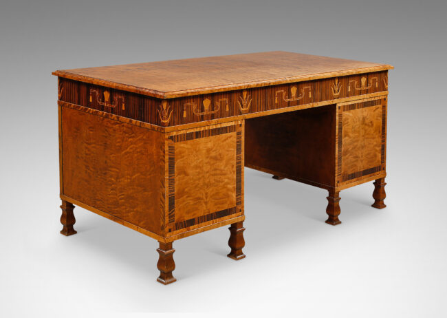 Gallery BAC rectangular top with three drawers across the top case and cabinets flanking the knee well