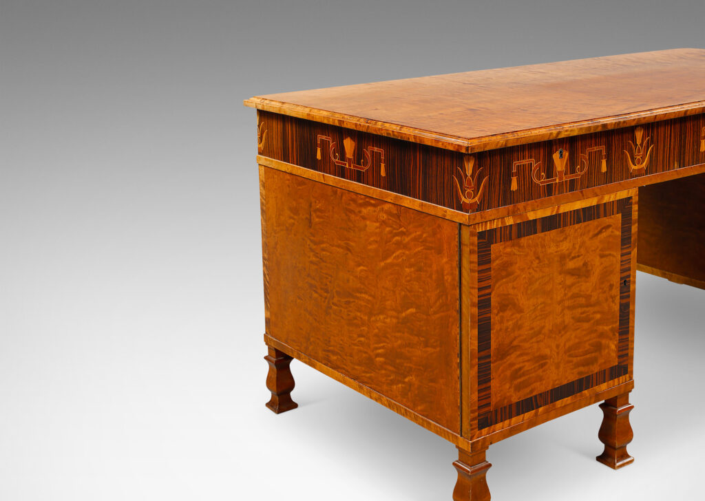 Gallery BAC rectangular top with three drawers across the top case and cabinets flanking the knee well