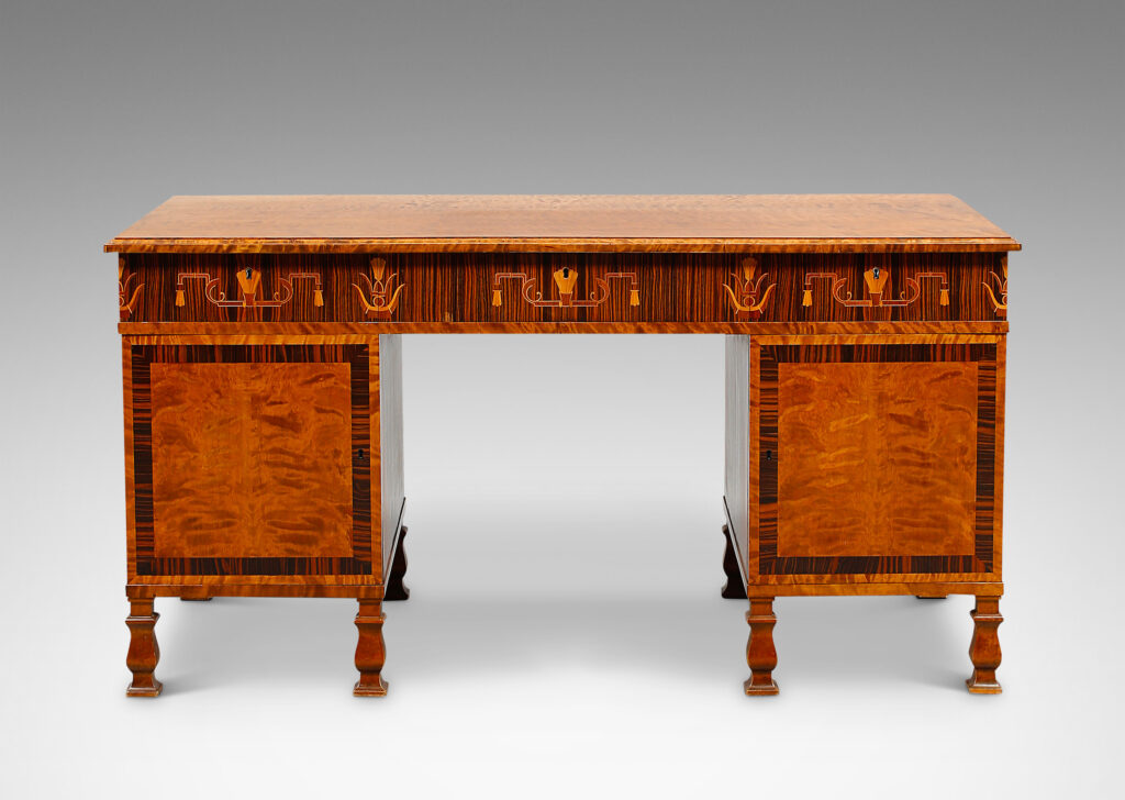 Gallery BAC rectangular top with three drawers across the top case and cabinets flanking the knee well