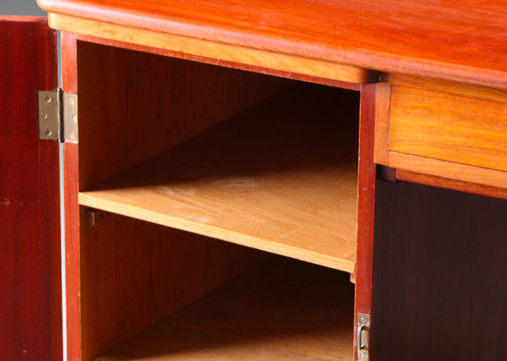 Gallery BAC rectangular top with one drawer above the knee well, flanked by two cabinets containing shelves and pull-out trays