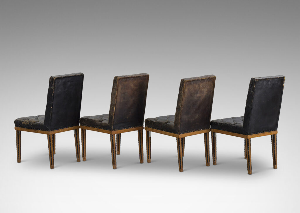 Gallery BAC high rectangular backs and tapered legs edged in beaded molding; mahogany and ebonized wood