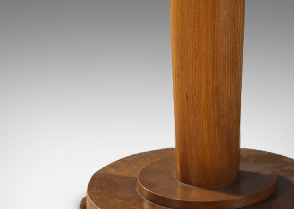 Gallery BAC floating round top on a tapered pedestal with stepped disk base; oak