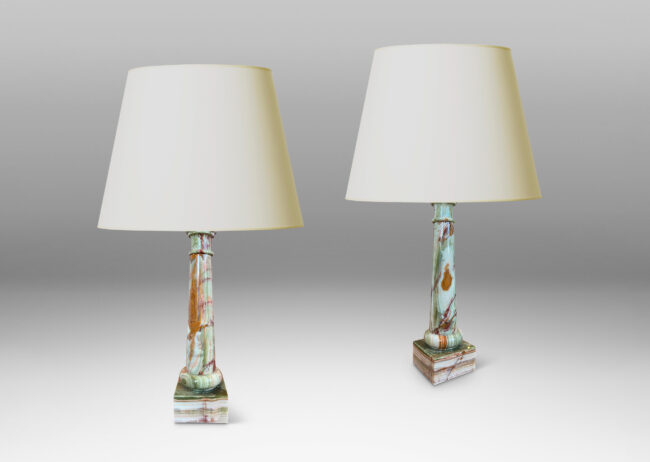 Gallery BAC lathed column forms on cube plinths in ivory, jade green and rust brown; onyx