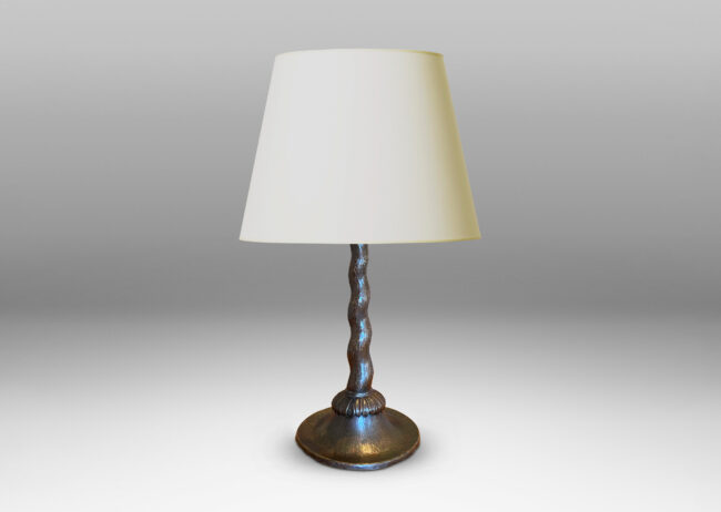 Gallery BAC tapered barley twist stand, flared disk base, and palmate detail, with an allover hammered finished; copper