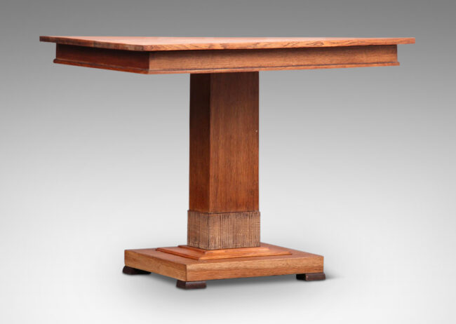 Gallery BAC rectangular top with subtle bead detail on sides, on a pillar pedestal with carved striae cuff, mounted on a rectangular base