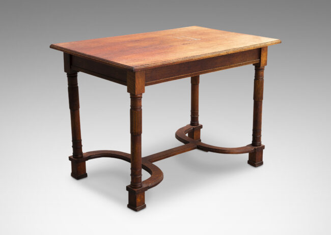 Gallery BAC rectangular top on four legs with abstract tassel ornaments and arced stretchers; oak