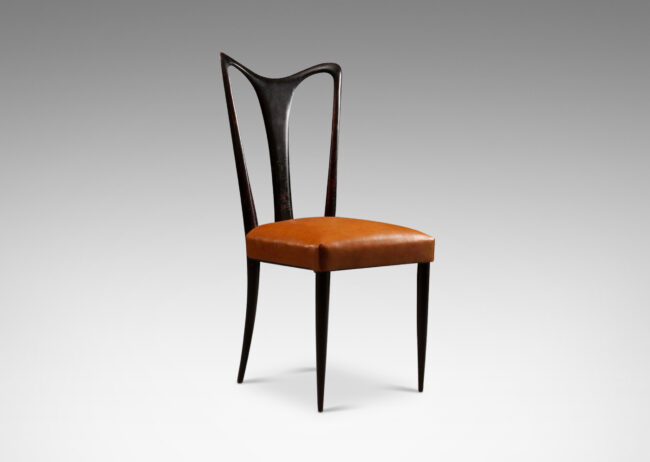 Gallery BAC sinuously modeled double loop back and slim legs in a dark stained finish