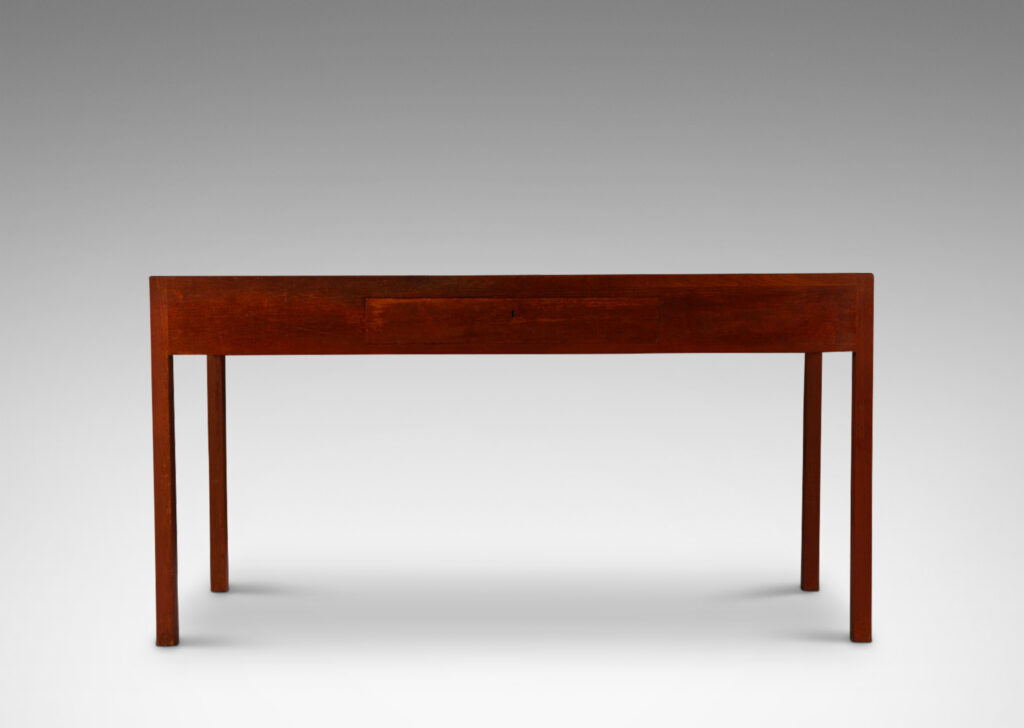 Gallery BAC subtly angled top with two drawers facing the sitter with another on the opposite side, all sensitively modeled in the designer’s signature style