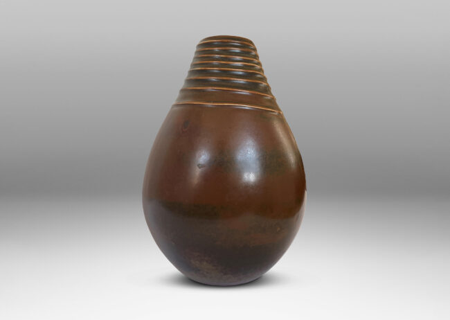 Gallery BAC drop form with spiral relief encircling the mouth, glazed in a milk chocolate brown