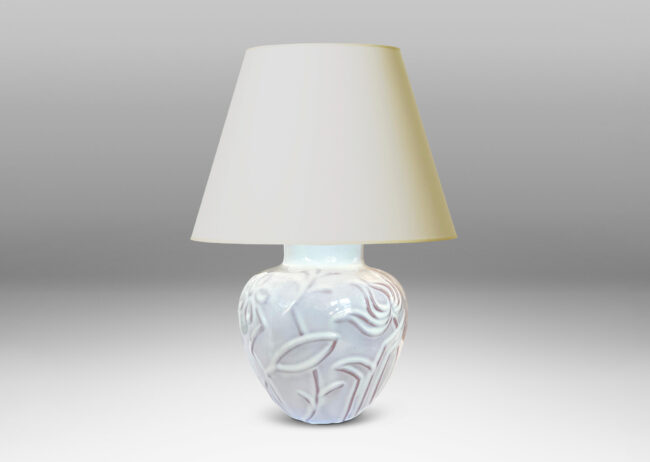Gallery BAC tapered apple-like forms with abstracted floral designs in relief, glazed in a shiny white