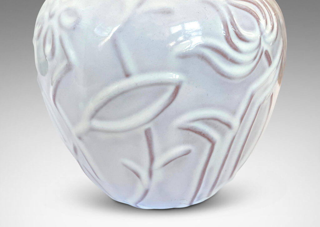 Gallery BAC tapered apple-like forms with abstracted floral designs in relief, glazed in a shiny white