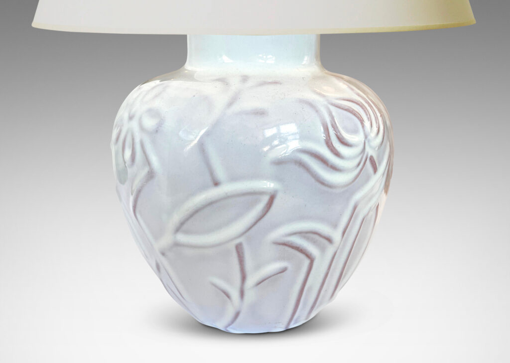 Gallery BAC tapered apple-like forms with abstracted floral designs in relief, glazed in a shiny white