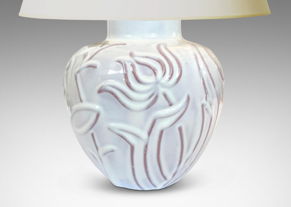 Gallery BAC tapered apple-like forms with abstracted floral designs in relief, glazed in a shiny white