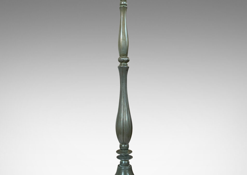 Gallery BAC tall sculpted stand on a bell-form base, all in an antique bronze patination