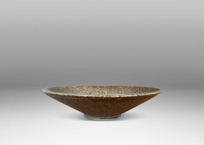 Gallery BAC shallow conical form with thick pale gray over brown glazing; stoneware