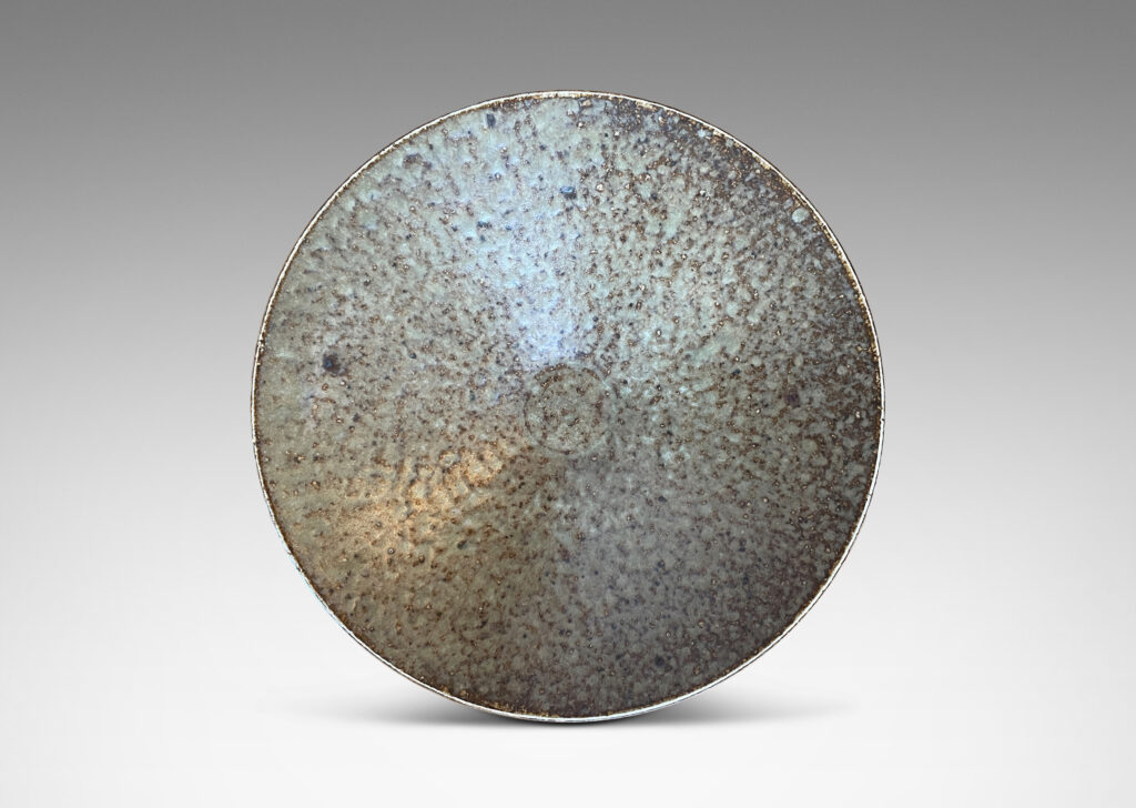 Gallery BAC shallow conical form with thick pale gray over brown glazing; stoneware