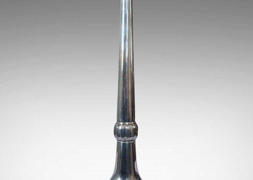 Gallery BAC tapered stand with engaged fob, flared trumpet base, and engraved details; silver plate