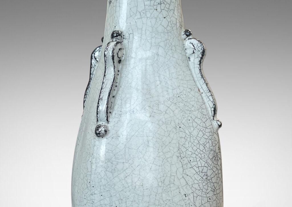 Gallery BAC arge squared swelling form with tendril-like ornaments, in white-black tin glaze