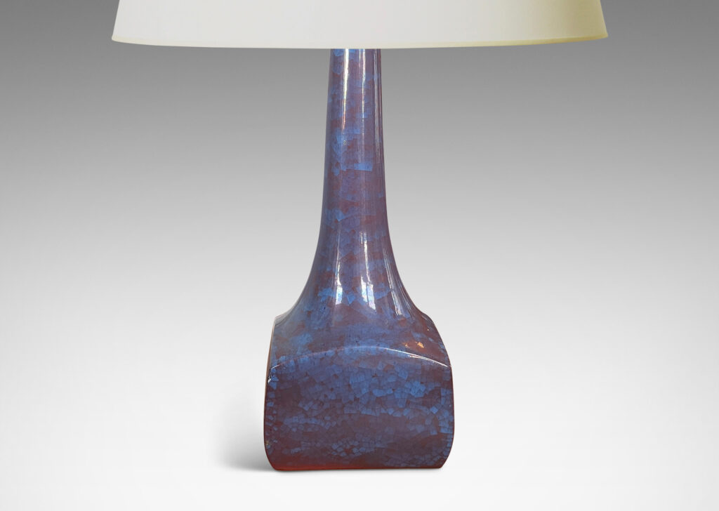 Gallery BAC low square box forms with tall sprouting necks, glazed in a cornflower blue and red luster craquel