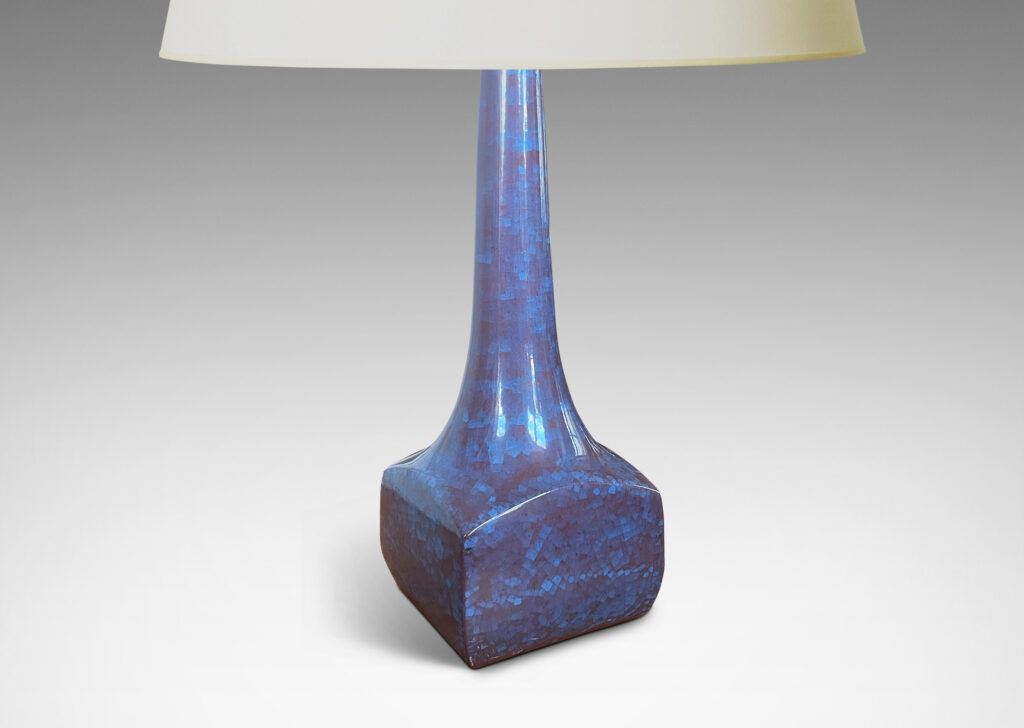 Gallery BAC low square box forms with tall sprouting necks, glazed in a cornflower blue and red luster craquel