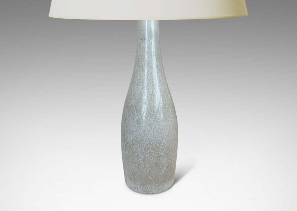 Gallery BAC swelling “bowling pin” form with carved diamond gird detail, glazed in a warm white with pale gray speckles