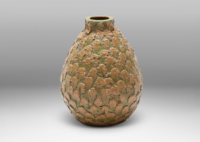 Gallery BAC form and applied texture of a pine cone, glazed in gold-tan and olive green