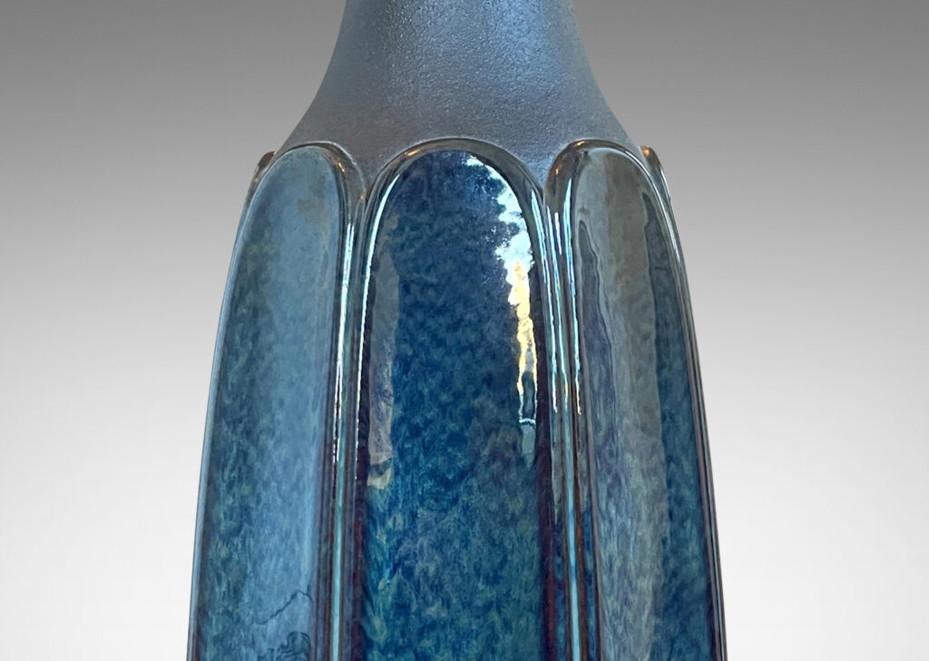 Gallery BAC organically modeled eight-sided form in luster blue and matte brown glazes