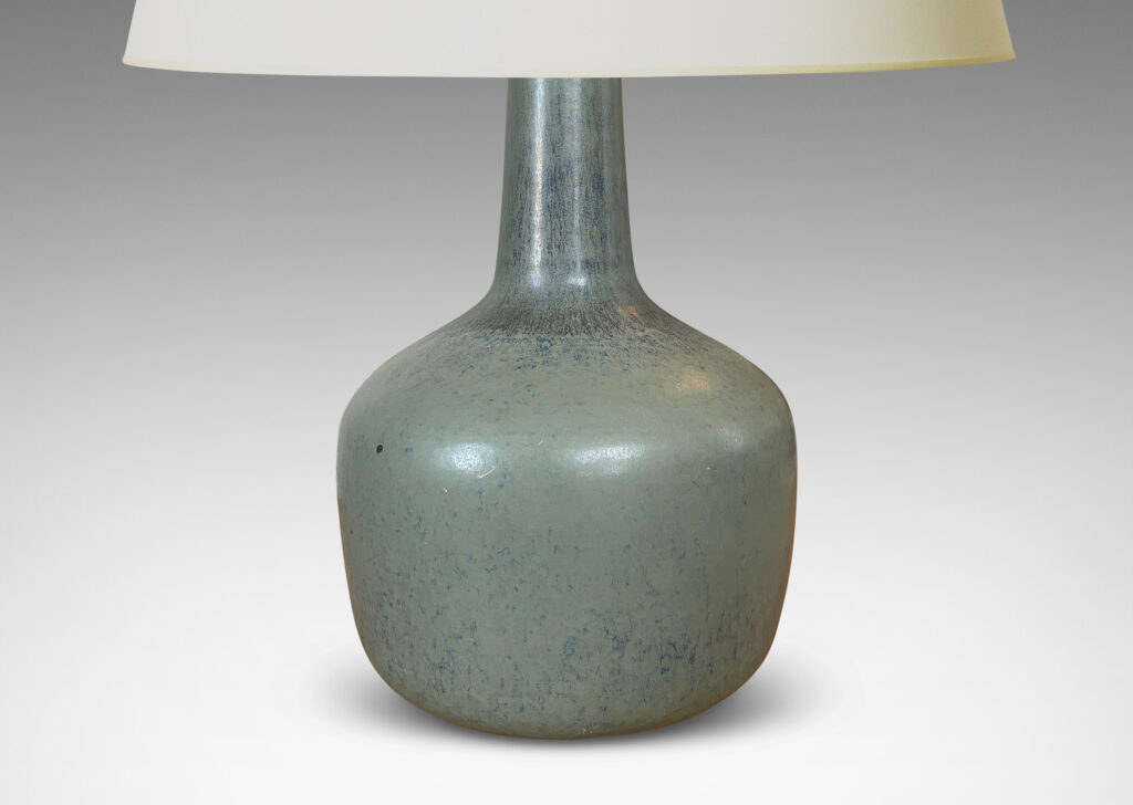 Gallery BAC tapered drum form and a tall sprouting neck, glazed in a light gray-blue