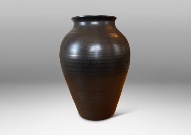 Gallery BAC classic tapered form with subtle throwing ridge texture, glazed in a rich espresso brown with eggshell finish