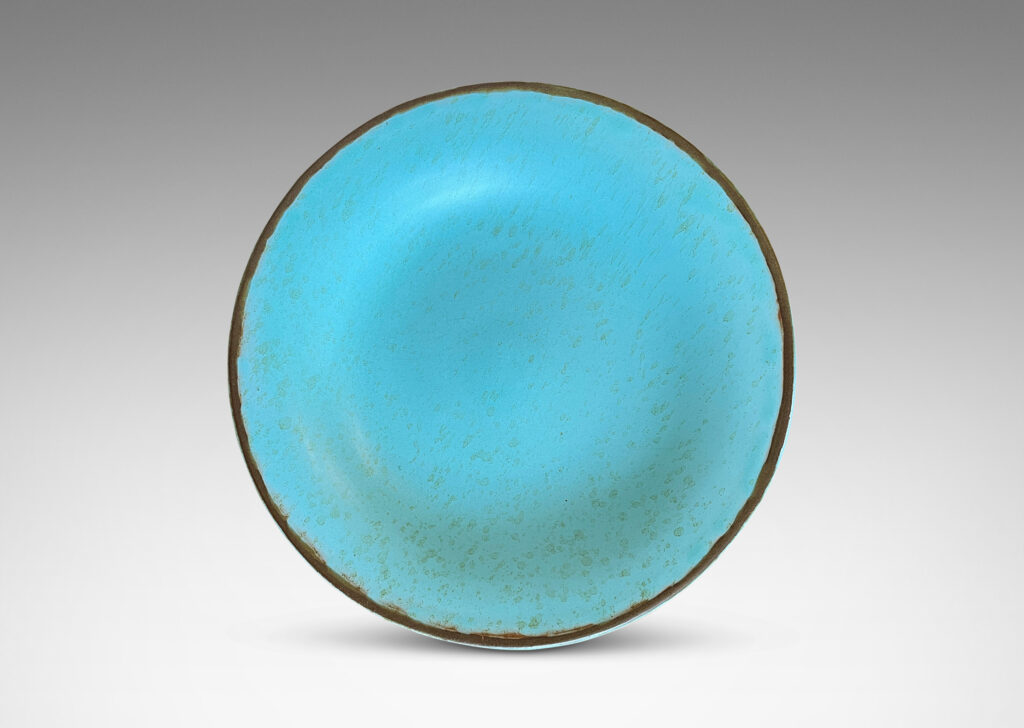 Gallery BAC shallow round form in turquoise glaze with brown rim and dappling