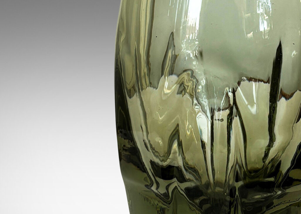 Gallery BAC ovoid form with lobed and tiered base on a foot in hand-blown olive tint glass