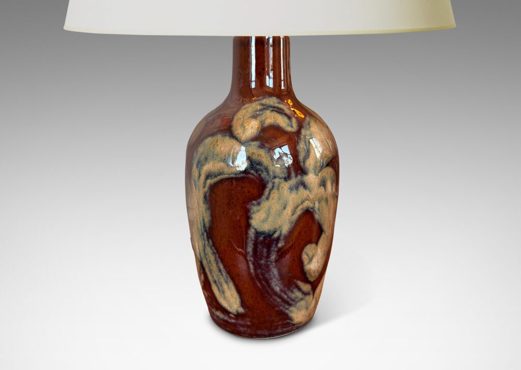 Gallery BAC classic tapered vase form, glazed in a warm burnt sienna brown with scrolling pattern in pale taupe