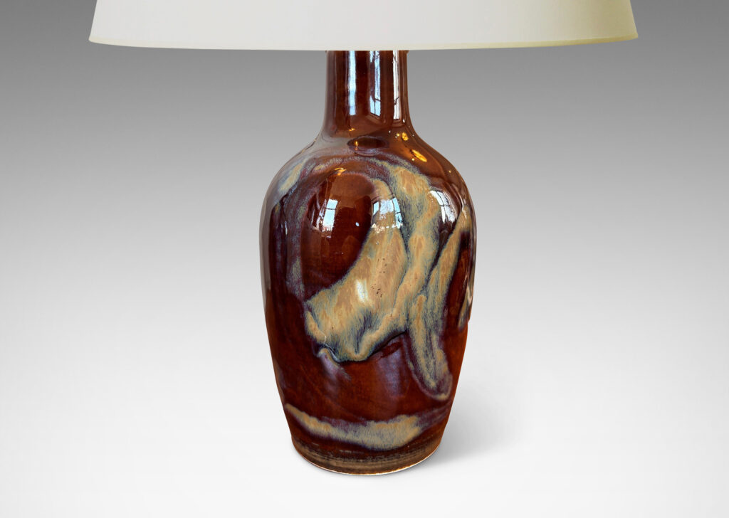 Gallery BAC classic tapered vase form, glazed in a warm burnt sienna brown with scrolling pattern in pale taupe