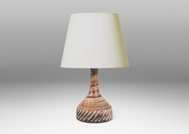 Gallery BAC large pawn-like form, with low drum and tall sprouting neck, glazed in marbled dark brown