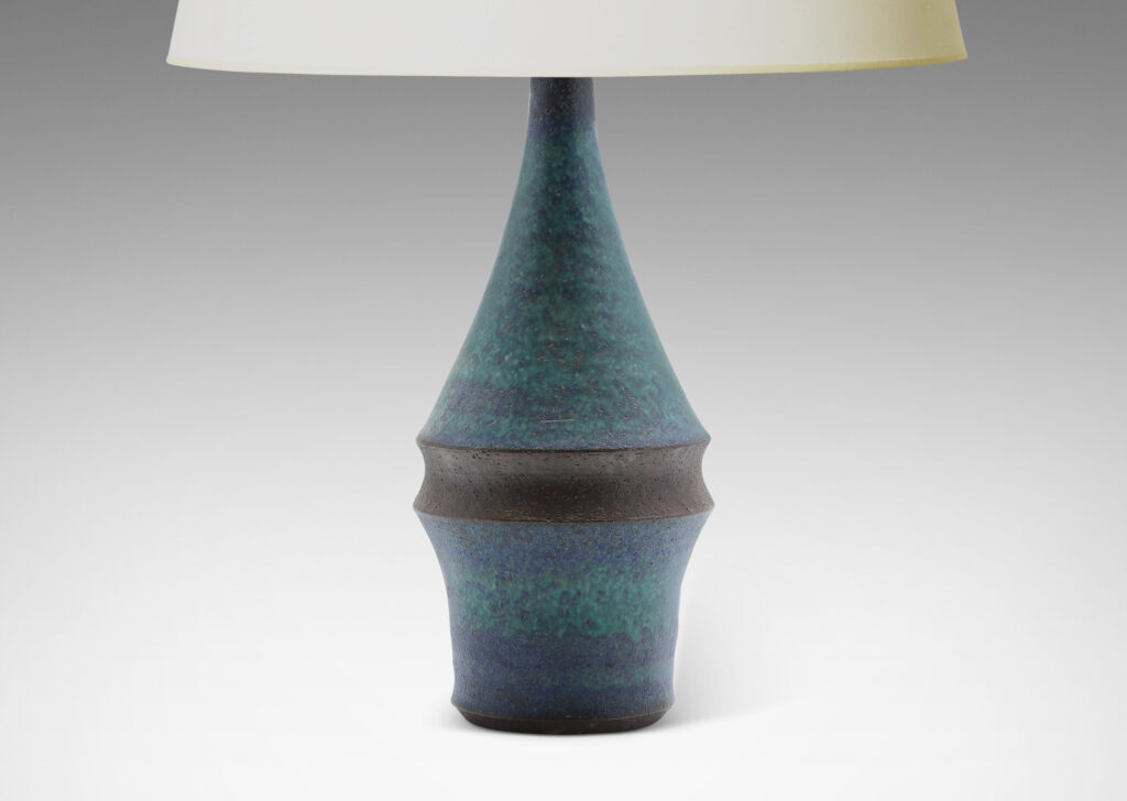 Gallery BAC notched pawn-like form with conical cap, glazed in mottled turquoise and azure tones with brown