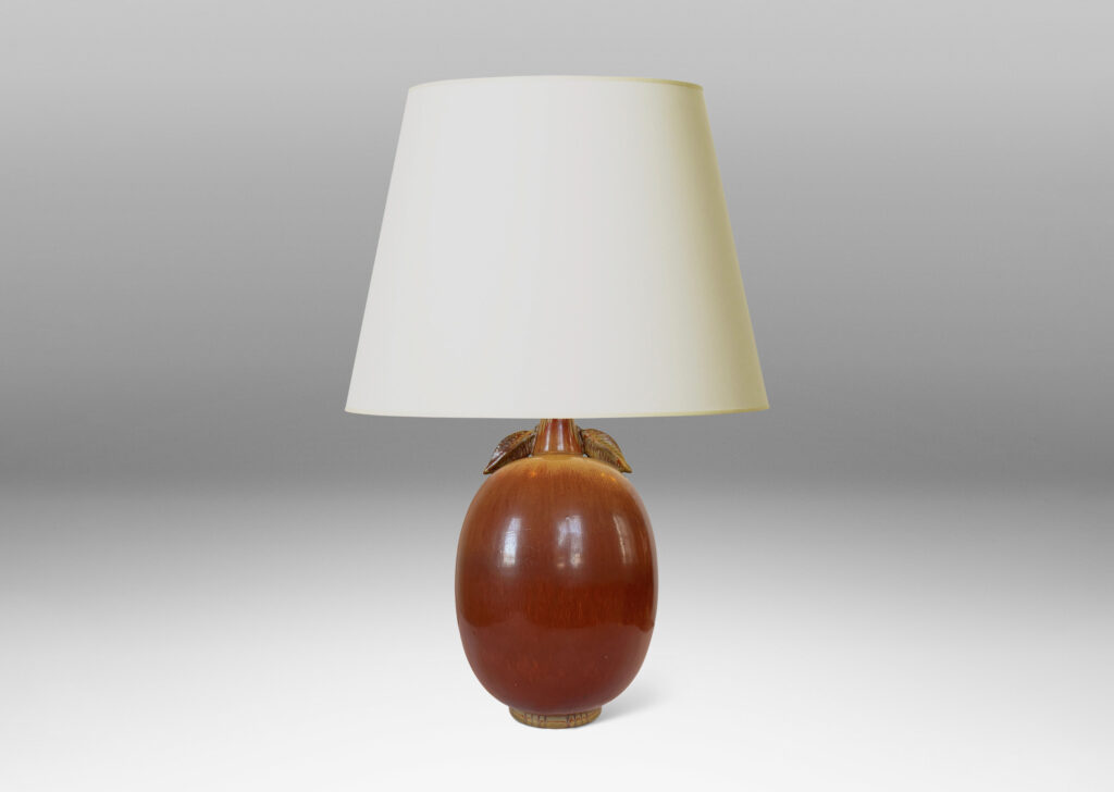 Gallery BAC ovoid form with stem-like neck with leaves, glazed in burnt sienna with tan accents