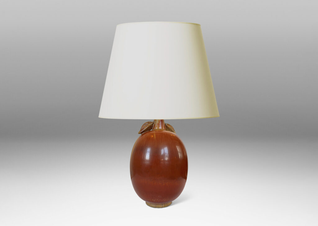 Gallery BAC ovoid form with stem-like neck with leaves, glazed in burnt sienna with tan accents