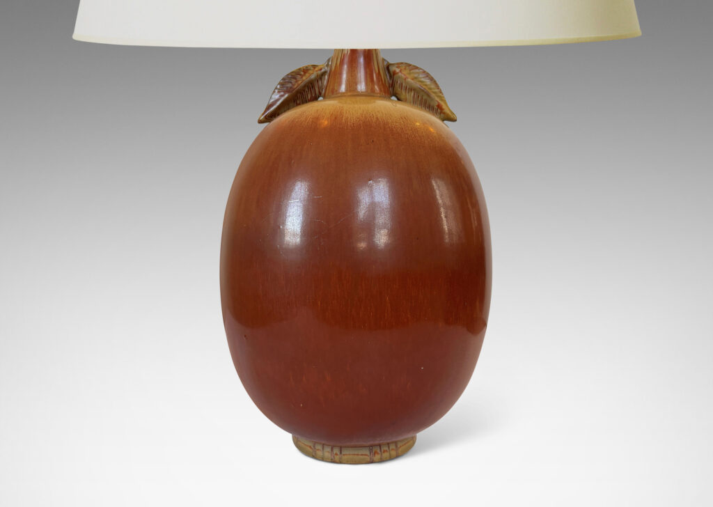 Gallery BAC ovoid form with stem-like neck with leaves, glazed in burnt sienna with tan accents