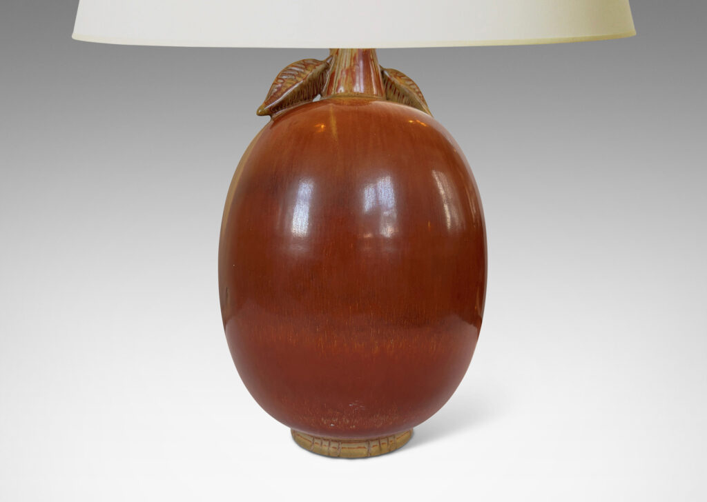 Gallery BAC ovoid form with stem-like neck with leaves, glazed in burnt sienna with tan accents