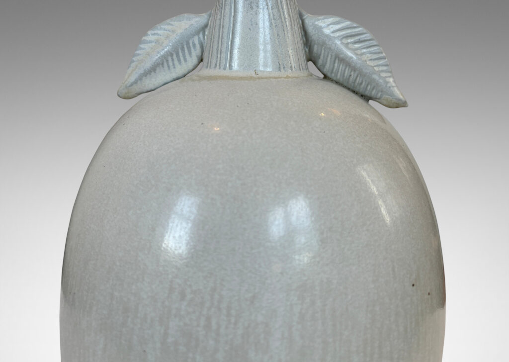 Gallery BAC ovoid form with stem-like neck with leaves in white and pale gray harefur glaze