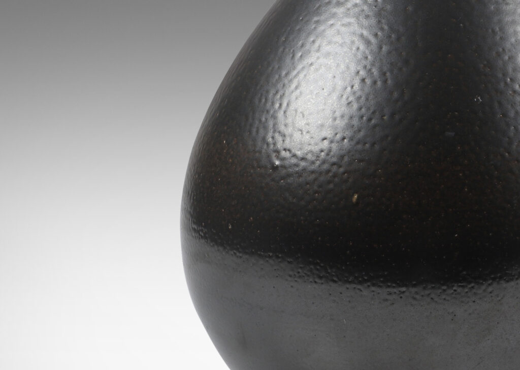 Gallery BAC drop form glazed in an orange peel finish dark brown glaze